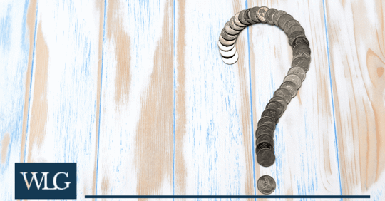 coins layed out in a question mark